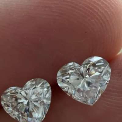 A 0.92ct and 0.90ct, GIA certified, both in beautiful H color with VS1 and VS2 clarity, coming together so naturally.