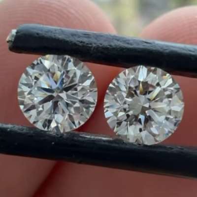 A 0.50ct & 0.50ct GIA Certified Matching Pair Of Natural E Color VVS2 & VS2 Clarity Round Brilliant Cut Diamond.
