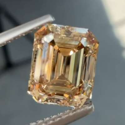 A 2.52ct GIA Certified Natural Fancy Yellowish Brown VS1 Clarity Emerald Cut Diamond