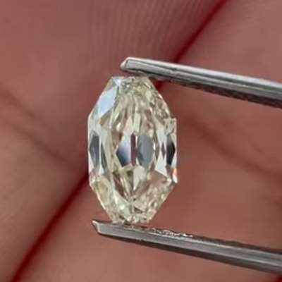 A 1.02cts natural M color VS1 old cut octagon shape diamond.
