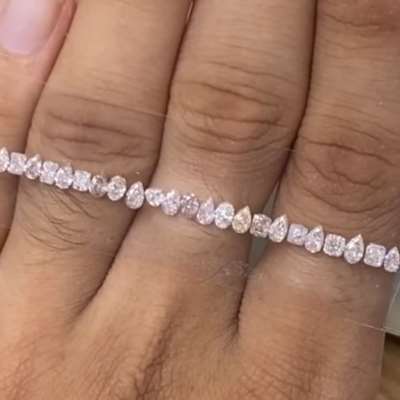 A 2.17cts total weight parcel of 24pcs Natural brownish pink VS–SI clarity mix shape diamonds