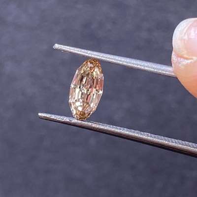 0.54cts Natural peachy brown VS1 clarity step cut Moval shape diamond 
