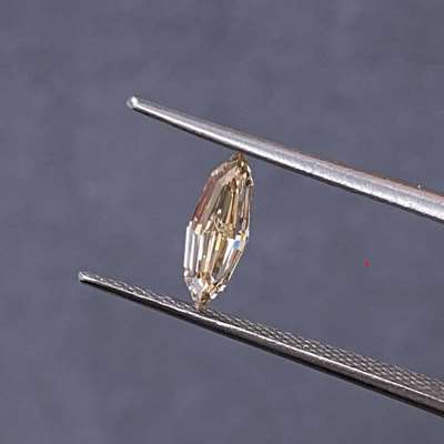 0.51cts Natural Peachy brown VS1 clarity Step cut Marquise shape diamond