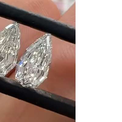 SALE. 0.54ct & 0.53ct GIA Certified Matching Pair Of Natural G & H Color VS1 Clarity Step Cut Pear Shape Diamond