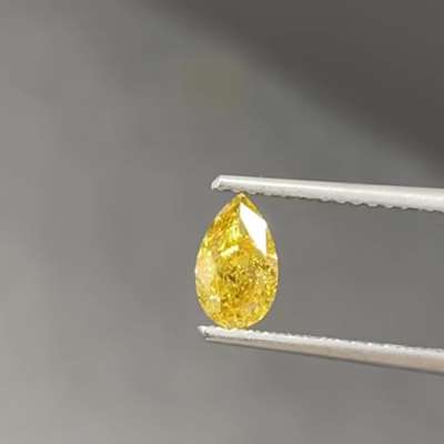 0.55ct Natural Fancy Intense Orangy Yellow colour VS1 Clarity Pear shaped diamond 