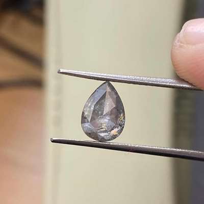 1.46cts natural salt and pepper rose cut pear, full of depth, story, and quiet sparkle.