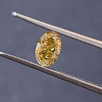 0.39cts Natural Orangy brown VS2 clarity oval shape diamond 