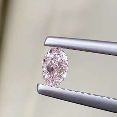 0.30ct GIA Natural Fancy Orangy Pink colour SI2 Clarity Oval diamond