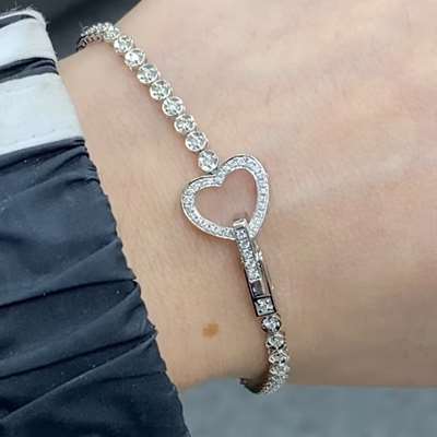 This dainty tennis bracelet looks beautiful for occasions or stacking with watches and other bracelets