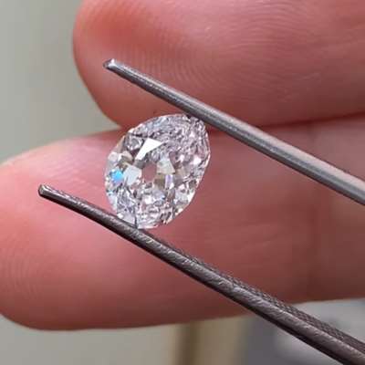  0.76-carat GIA-certified natural diamond, featuring a rare D-color and VS1 clarity.