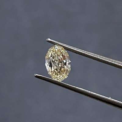 0.80ct peachy brown oval With VVS2 clarity