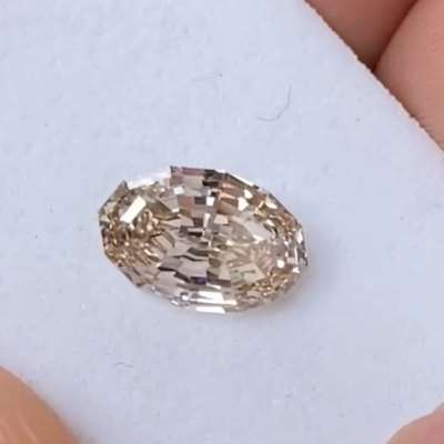 1.22cts Natural peachy brown VS1 clarity step cut oval shape diamond