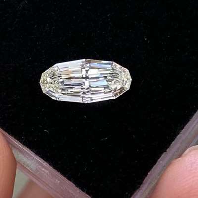 1.01cts GIA certified Natural K color VS1 clarity step cut long oval shape diamond 