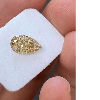 2.10cts Natural peachy brown vs2 clarity pear shape diamond