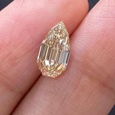 1.51cts Natural yellowish brown VS1 clarity step cut pear shape diamond