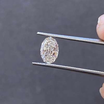 A 1.07ct Peachy Brown oval step cut with VS1 clarity, 