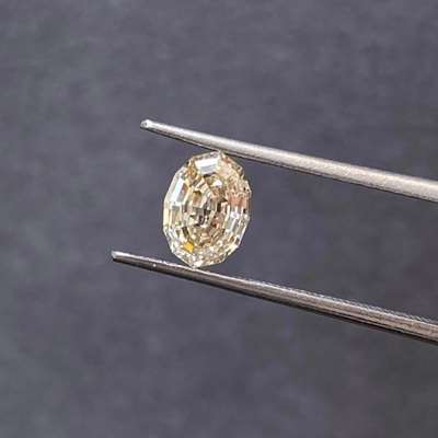 A 1.00ct natural champagne brown diamond in a sleek oval step cut,VVS2 clarity