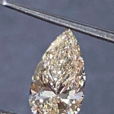 1.01cts Natural Peachy Brown VVS2 clarity Pear Shape Diamond