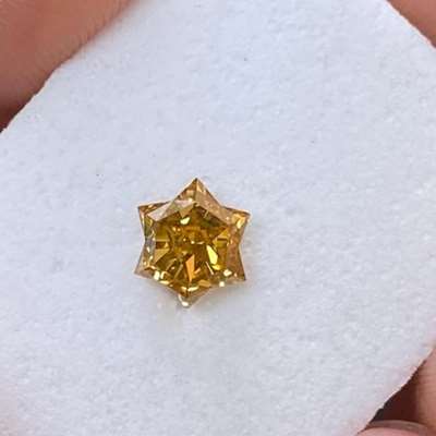 0.60cts Natural golden brown si1 clarity star shape diamond 