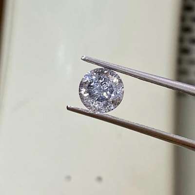  1.06ct natural salt & pepper round brilliant cut diamond, and it’s every bit as mesmerizing.