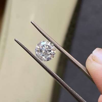 1ct natural salt and pepper round brilliant cut diamond, full of character and depth. 