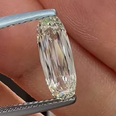 1.71 carats of pure, GIA-certified magic—a super long scissor-cut diamond, L Color,VS1 Clarity