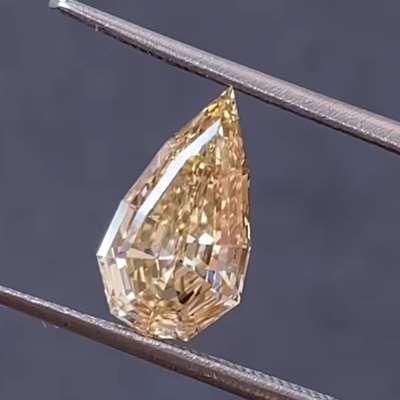 1.61cts Natural Peachy Brown VS1 Clarity Step Cut Pear Shape Diamond