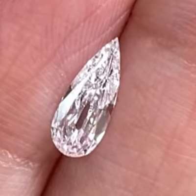  0.51cts of natural sparkle, GIA certified, with a crisp D color and VS2 clarity pear shape diamond