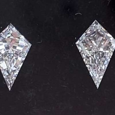 0.39 carat total weight pair of natural G-H color, VS clarity kite shape diamonds 