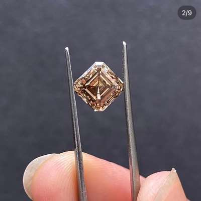  2.11ct Asscher it’s the warm brown tone  VVS2 clarity