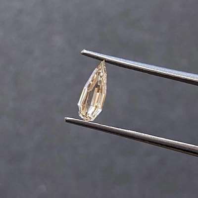  0.34ct natural peachy brown pear vs1 clarity