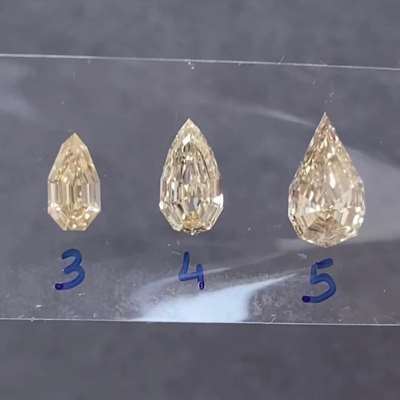 0.77cts Natural champagne brown VS1 clarity step cut pear shape diamond. Bright and balanced in shape.