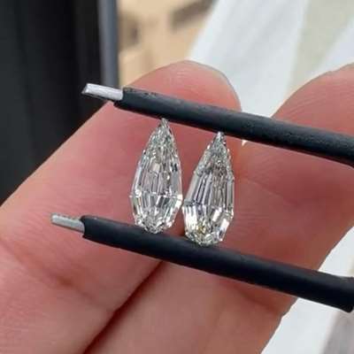 0.5ct and 0.52ct Total weight Matching pair of GIA Natural I colour VVS1 and VS2 Clarity Super lustrous Step Cut Pear diamonds 