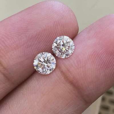 0.50ct & 0.50ct Matching Pair Of GIA Certified Natural J Color VVS1 Clarity Round Brilliant Cut Diamonds For SALE.