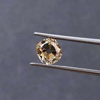 A 1.50 ct Natural Peachy Brown Old-Cut Cushion Diamond with VS1 clarity
