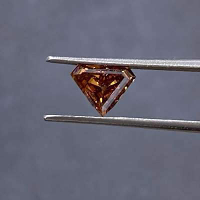 A 1.02 ct Natural Reddish Brown Superman-shaped Diamond With SI1 clarity