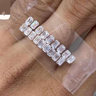 2.36ct layout of 18 natural FG color, VVS-VS clarity emerald cut diamonds