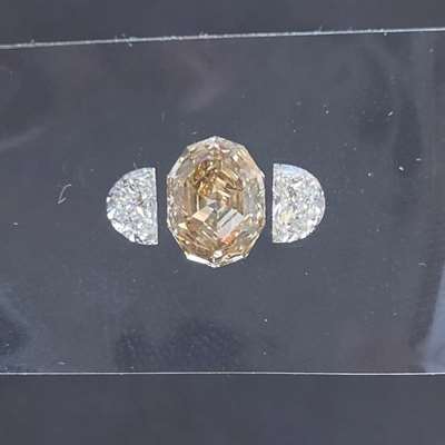 1.13ct Brown Oval Step-Cut (ST6614) Two Half-Moon G VVS2 (ST5692), 0.36ct total