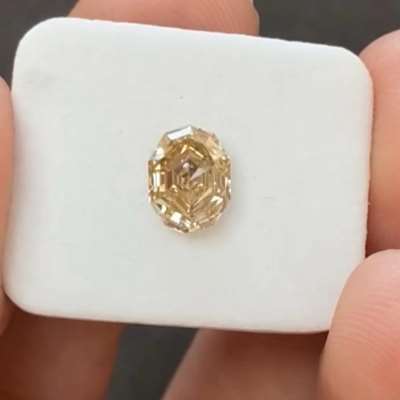  1.13 carat Natural Peachy Brown Step Cut Oval Diamond