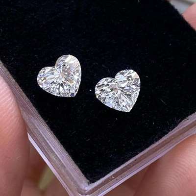 pair of 0.81ct GIA-certified heart-shaped diamonds, both in the rare F color with VVS1 and VVS2 clarity. 