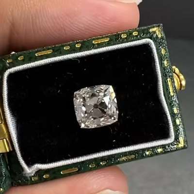  2.01ct has a super amazing old miner cut also known as Peruzzi cut