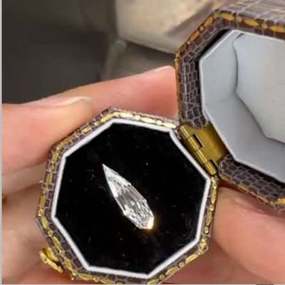 0.90ct GIA Certified Natural G color vs2 Clarity super long and skinny step cut pear shape diamond .