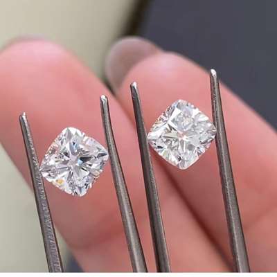 0.80ct and 0.82ct GIA certified natural H color cushion shape diamonds, paired with VS2 and VVS2 clarity.