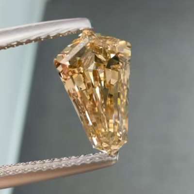 2.03ct Natural Honey Brown Color Step Cut Kite Shape Diamond.