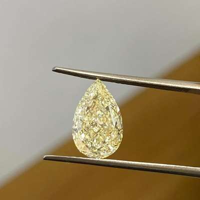 3.03ct GIA Certified Natural Light Yellow (w to x range) VS2 Clarity Pear Shape Diamond.