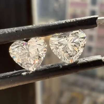 0.59ct & 0.59ct GIA Certified Matching Pair Of Natural D Color VS2 Clarity Heart Shape Diamond Pair.