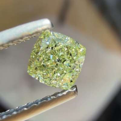 0.56ct GIA Certified Natural Fancy Yellow Green VVS2 Clarity Cushion Cut Diamond.