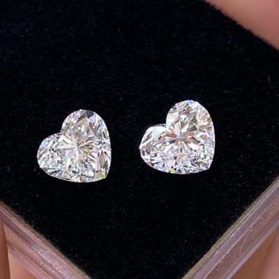 1.01cts each GIA certified heart shaped diamonds in icy D color with VVS2 clarity