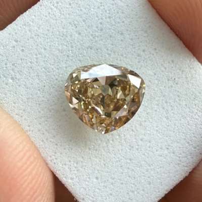 1.75ct old cut heart in a beautiful honey brown tone with VS2 clarity