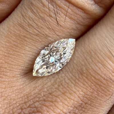 1.50cts natural O-P light brown marquise diamond with  VS1 clarity